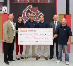 Dunkin' gives OHHS a $5,000 check for Adopt A Highlander